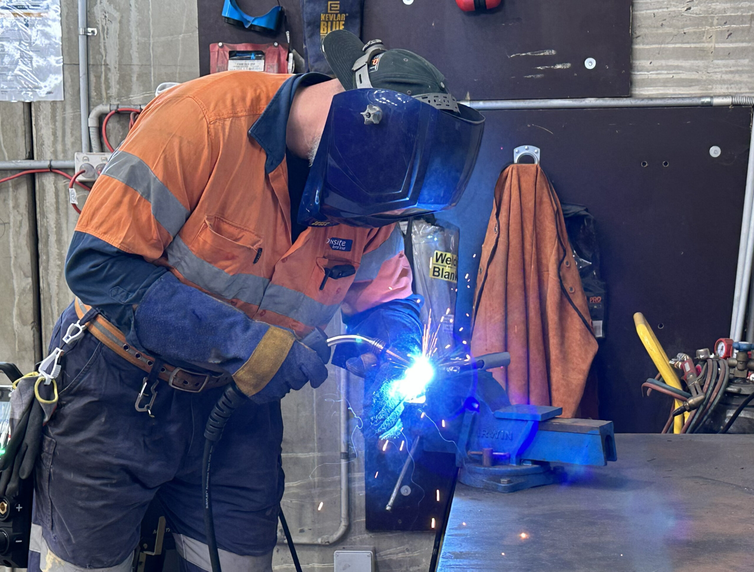 Onsite Rentals worker using a dual welder compressor